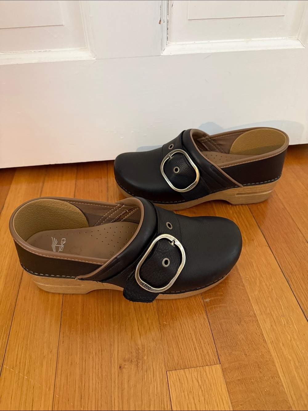 Dansko Black Leather Clogs with Silver Buckles and Tan Interior